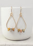 Bijou by SAM Stardust teardrop hoop earrings featuring crazy lace agate beads in cream, coral, and tan on gold fill.