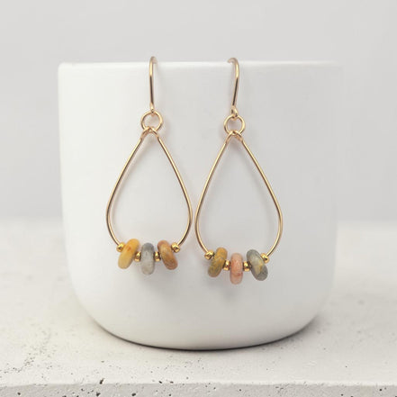 Bijou by SAM Stardust teardrop hoop earrings featuring crazy lace agate beads in cream, coral, and tan on gold fill.