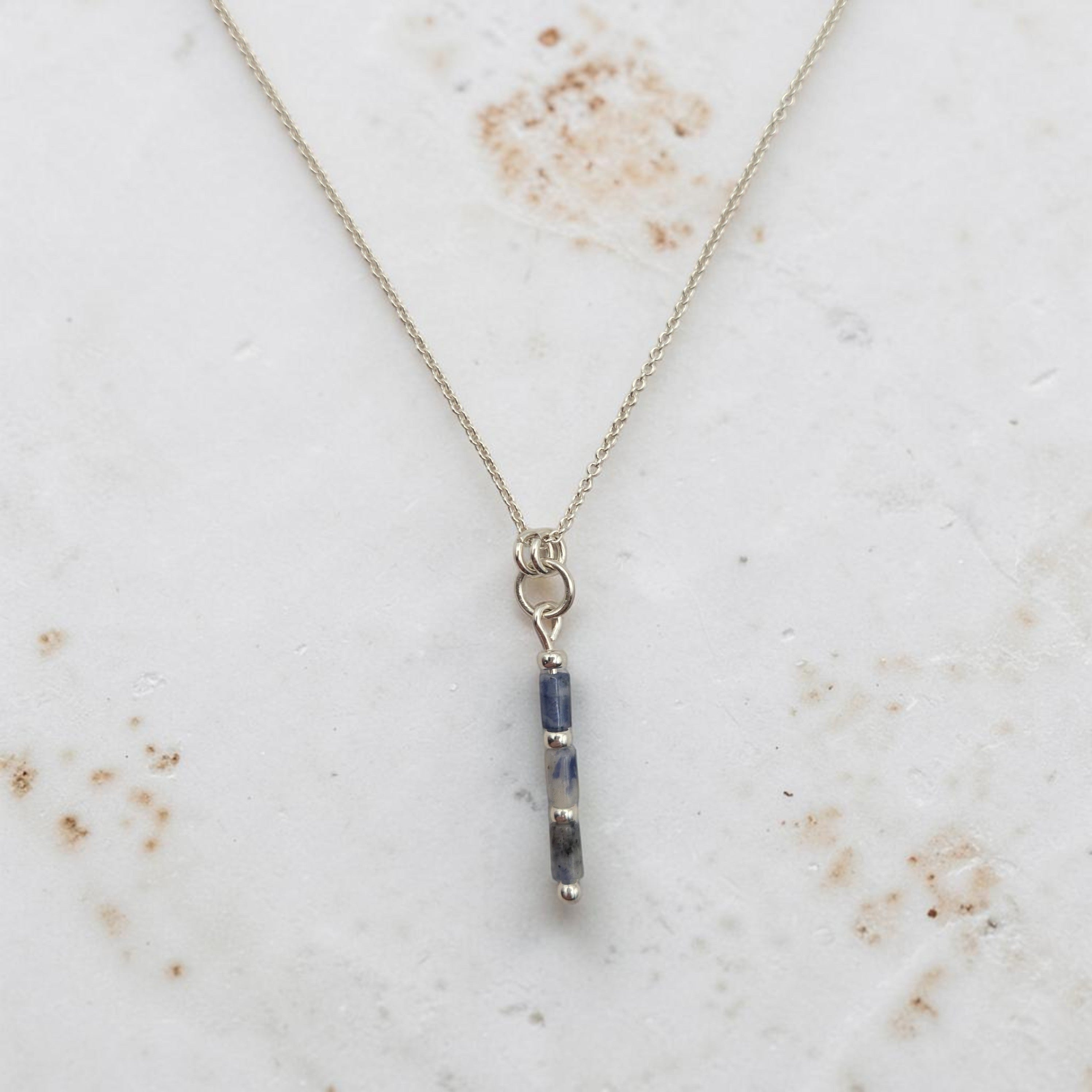 Bijou by SAM Stone Creek necklace featuring a blue spot jasper tube bead pendant on a sterling silver chain.