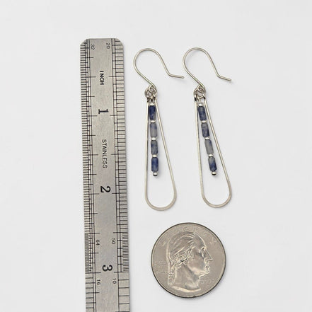 Bijou by SAM Stone Creek teardrop earrings with blue spot jasper beads and sterling silver hoops next to a ruler.