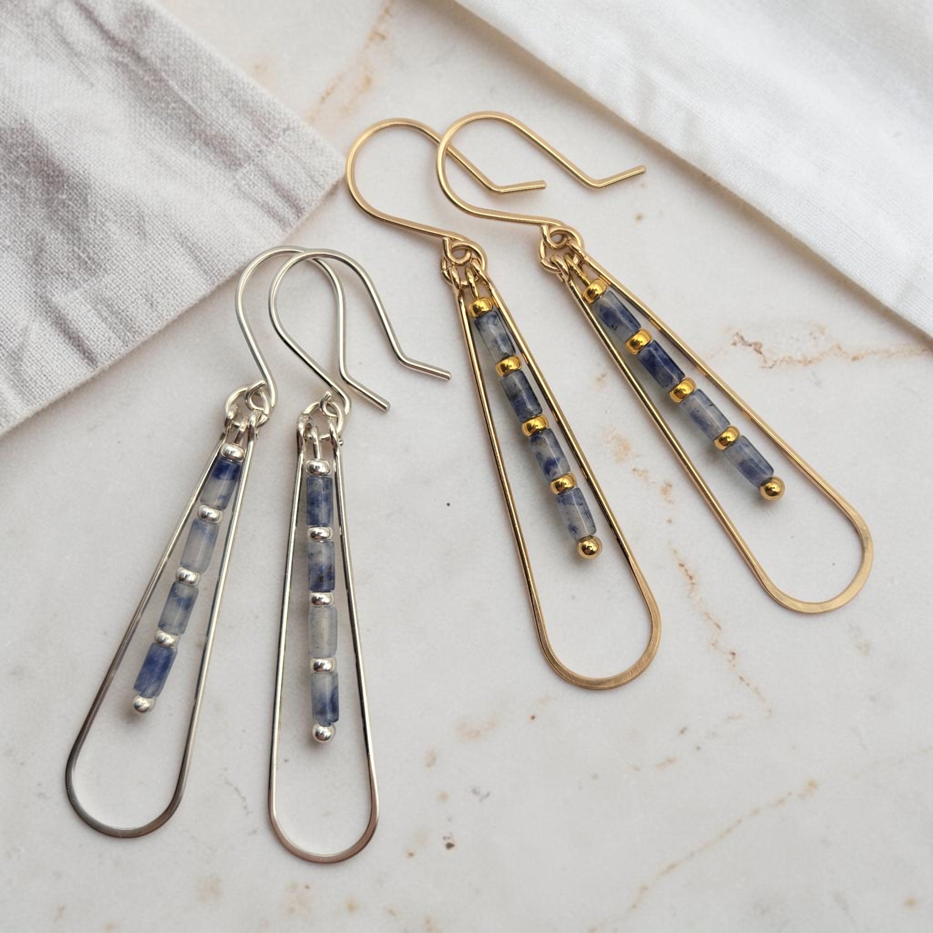 Bijou by SAM Stone Creek teardrop hoop earrings with blue spot jasper beads in 14k gold fill and sterling silver.