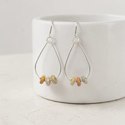 Bijou by SAM Stardust teardrop hoop earrings featuring crazy lace agate stones in sterling silver wire.