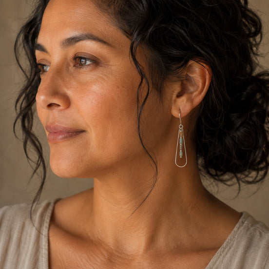 Bijou by SAM Open Sky teardrop earrings with Aqua Terra Jasper beads on a woman wearing a neutral top