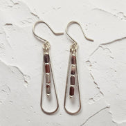Bijou by SAM Painted Bluff teardrop hoop earrings with maroon and gray Red Rainbow Jasper beads in sterling silver.