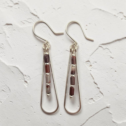 Bijou by SAM Painted Bluff teardrop hoop earrings with maroon and gray Red Rainbow Jasper beads in sterling silver.