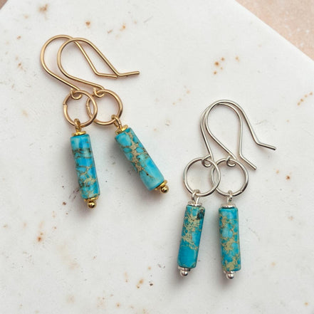 Bijou by SAM Mia earrings featuring turquoise jasper cylinders on handcrafted gold and silver hoops.