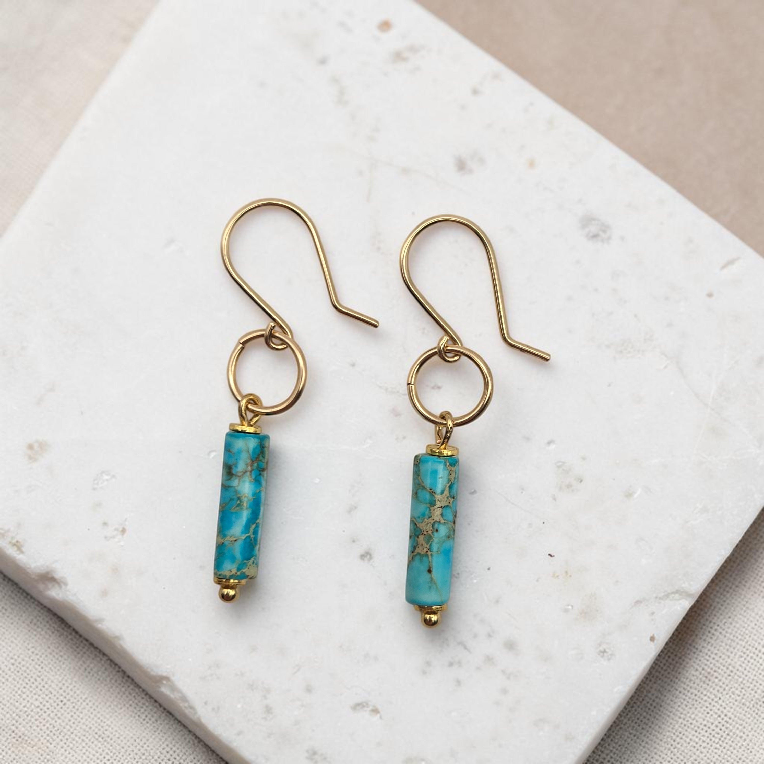 Bijou by SAM Mia earrings featuring turquoise jasper cylinders on 14k gold fill hoops and earwires.