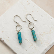 Bijou by SAM Mia earrings featuring turquoise jasper cylinder stones on handcrafted sterling silver hoops.