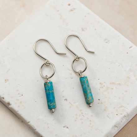 Bijou by SAM Mia earrings featuring turquoise jasper cylinder stones on handcrafted sterling silver hoops.