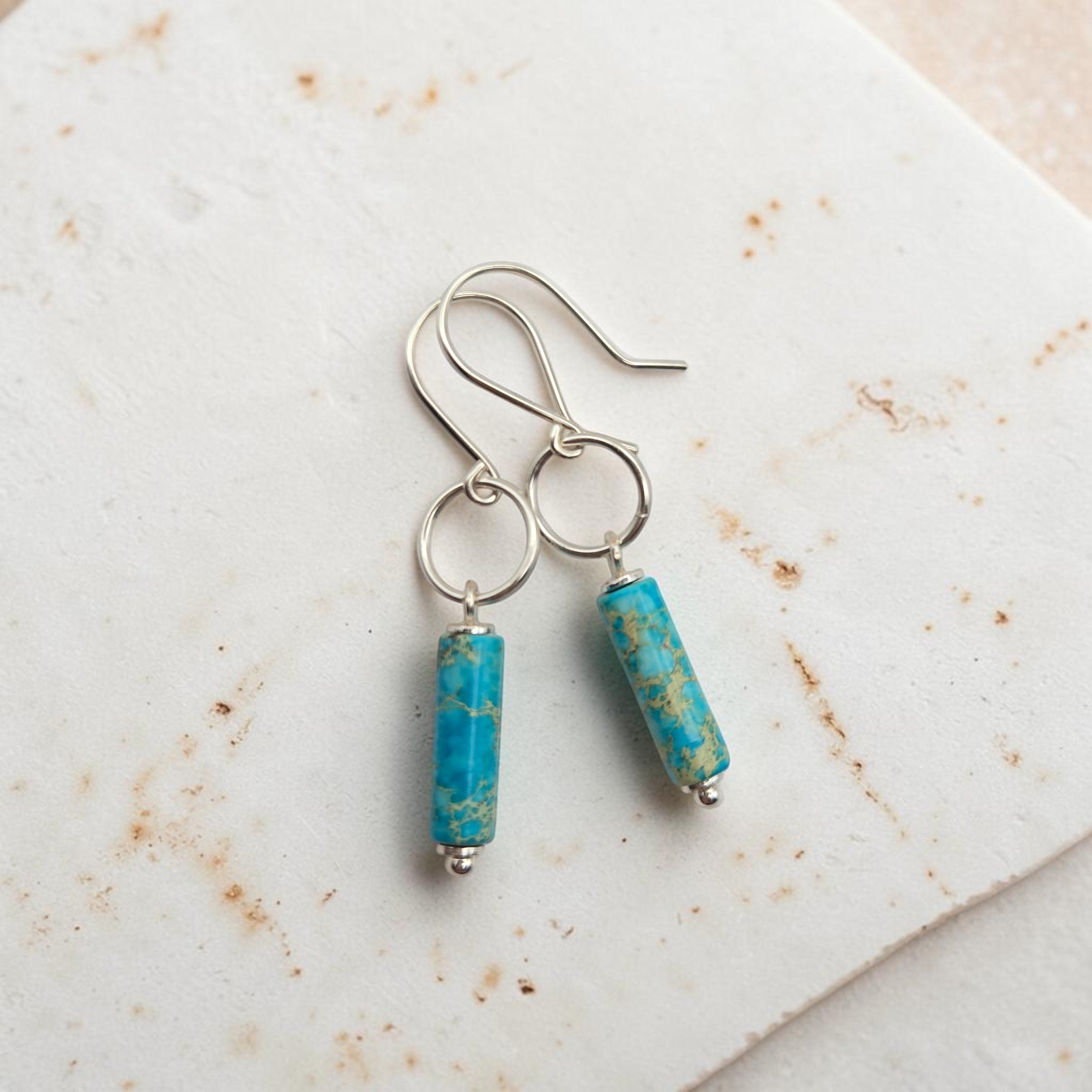 Bijou by SAM handmade sterling silver earrings featuring turquoise jasper cylinder stones on simple hoops