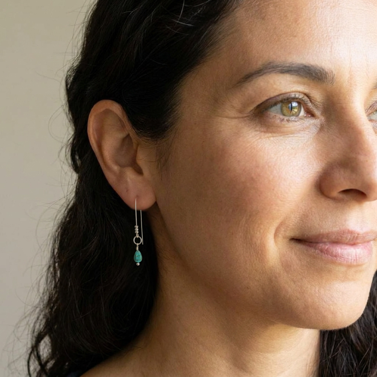 Bijou by SAM teardrop turquoise threader earrings in sterling silver worn by a woman with dark hair