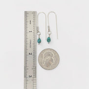 Bijou by SAM handcrafted sterling silver threader earrings featuring genuine teardrop turquoise stones next to a ruler