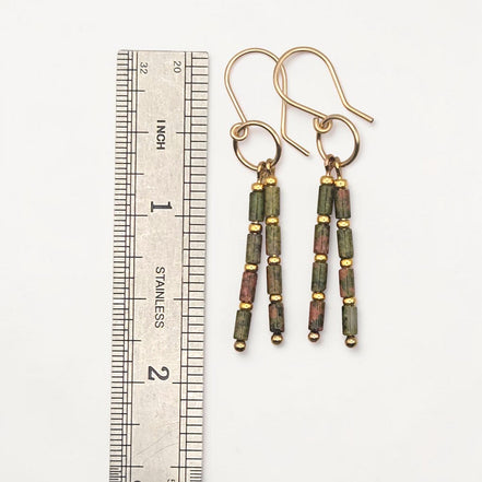 Bijou by SAM Forest Floor earrings featuring green and pink Unakite tube beads on 14k gold fill hoops with a ruler.