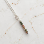 Bijou by SAM Forest Floor necklace featuring a delicate Argentium sterling silver chain and Unakite tube bead pendant.