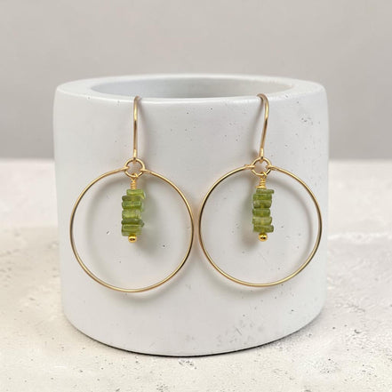 Bijou by SAM handmade gold hoop earrings featuring a delicate stack of square-cut deep green Vesuvianite gemstones.
