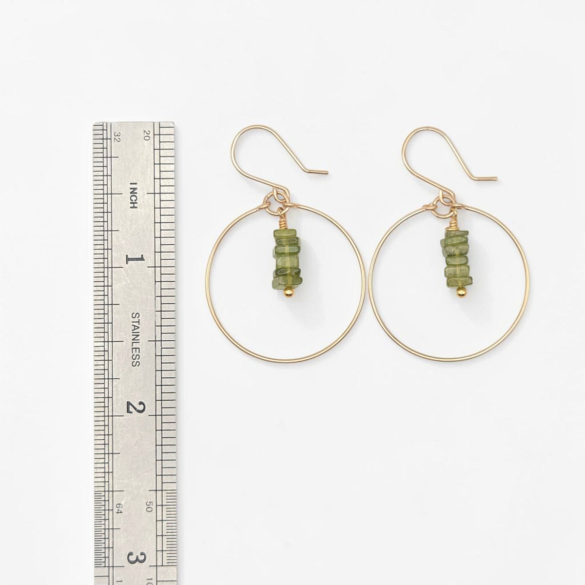Bijou by SAM handmade gold hoop earrings featuring a delicate stack of deep green square-cut Vesuvianite gemstones.