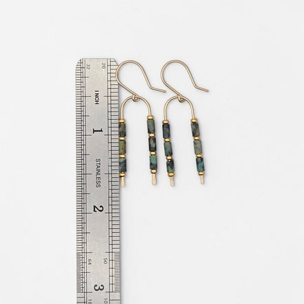 Bijou by SAM wishbone earrings featuring African Turquoise tube stones and 14k gold fill wire measured against a ruler.