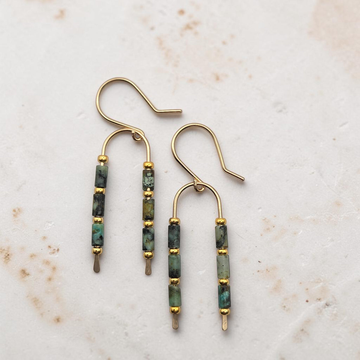 Bijou by SAM handcrafted wishbone earrings featuring African Turquoise tube stones and 14k gold fill wire.