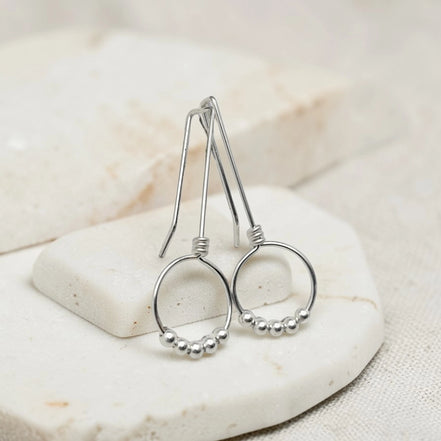 handmade silver beaded threader earrings with five silver beads