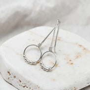 handmade silver threader hoop earrings with five silver beads