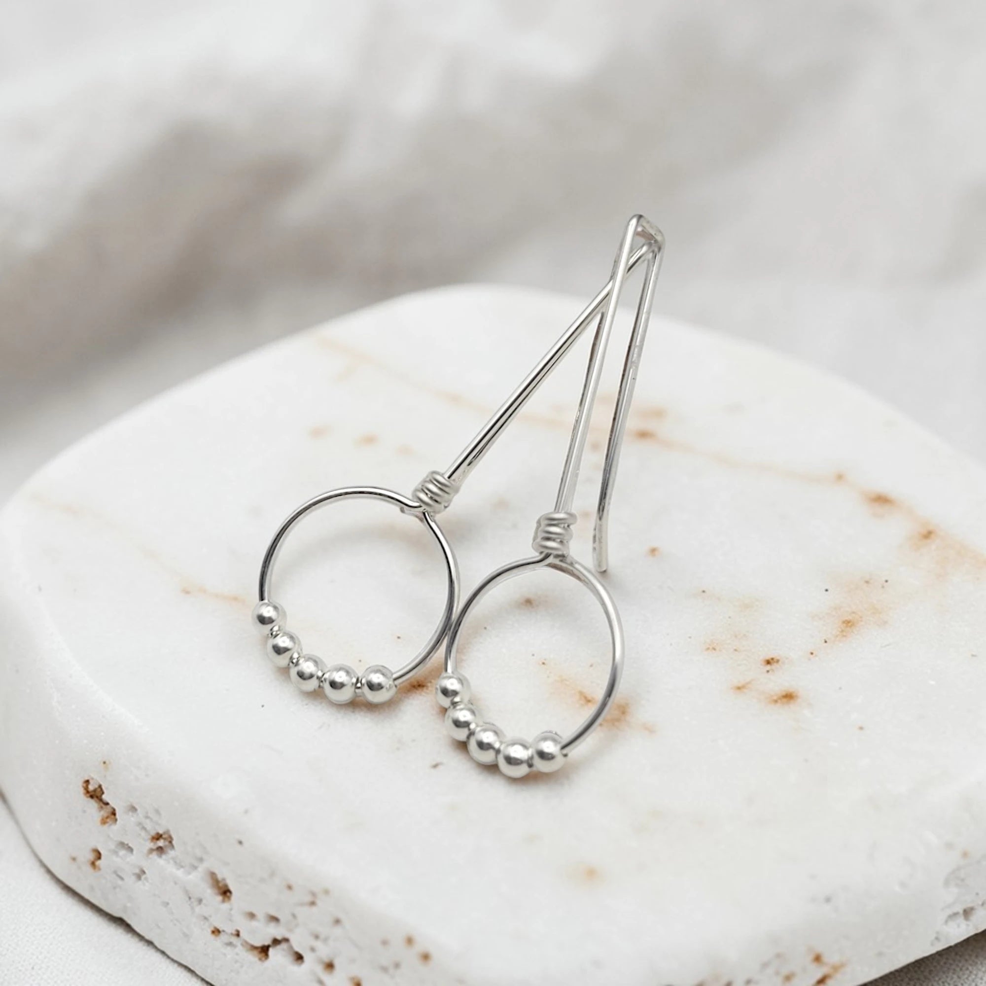 handmade silver threader hoop earrings with five silver beads