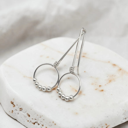 handmade silver threader hoop earrings with five silver beads